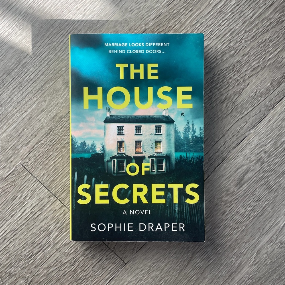The House of Secrets Novel by - Blue and Yellow Cover